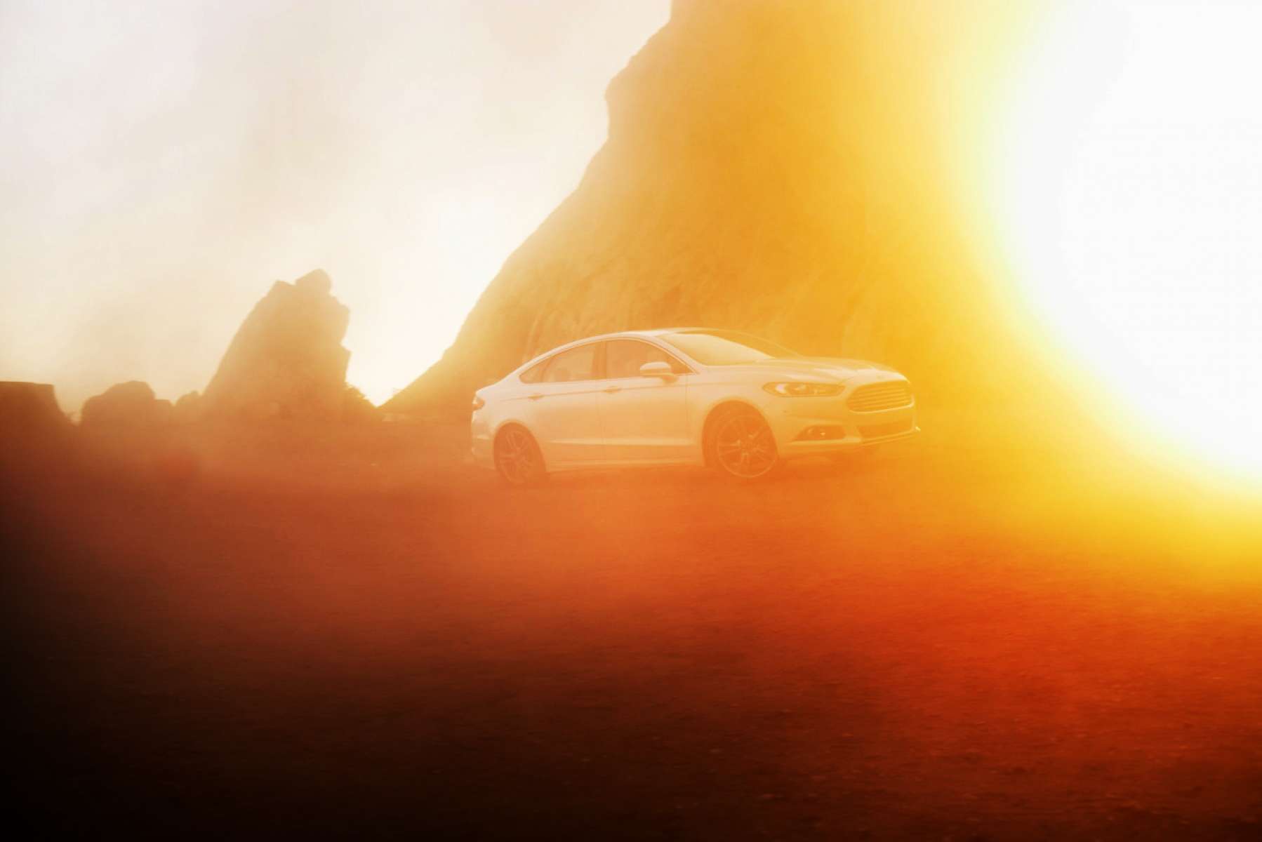 51f68674682c6_Christian_Kozowyk_white_car_sunset_flare